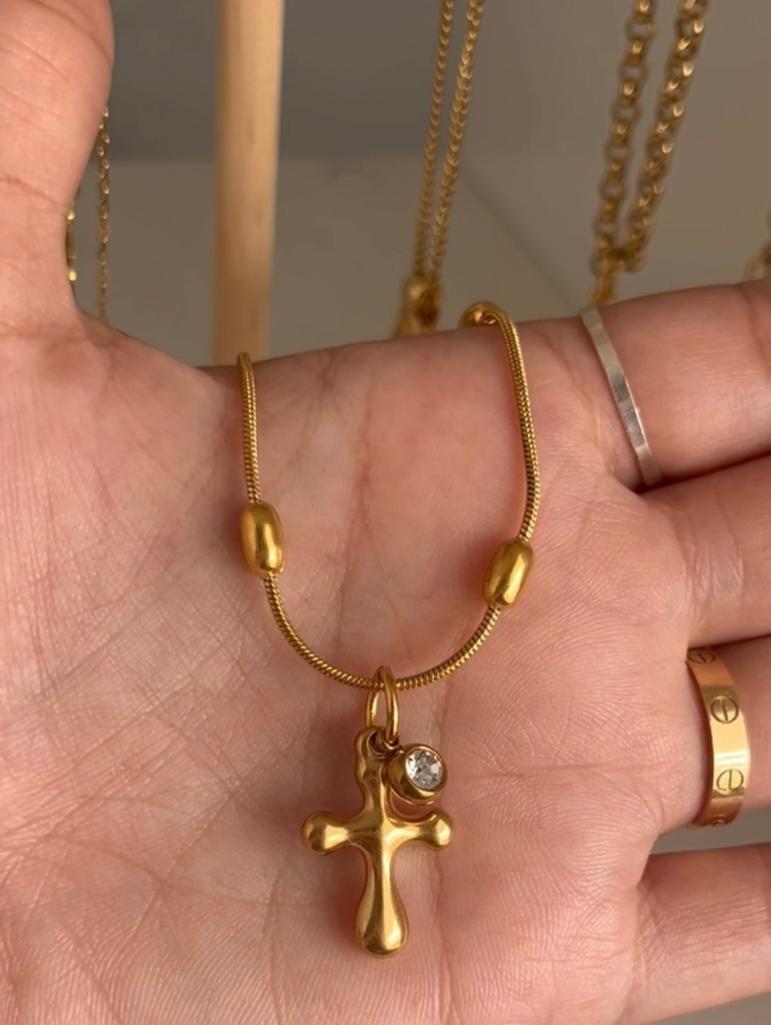 Cross and pearl necklace